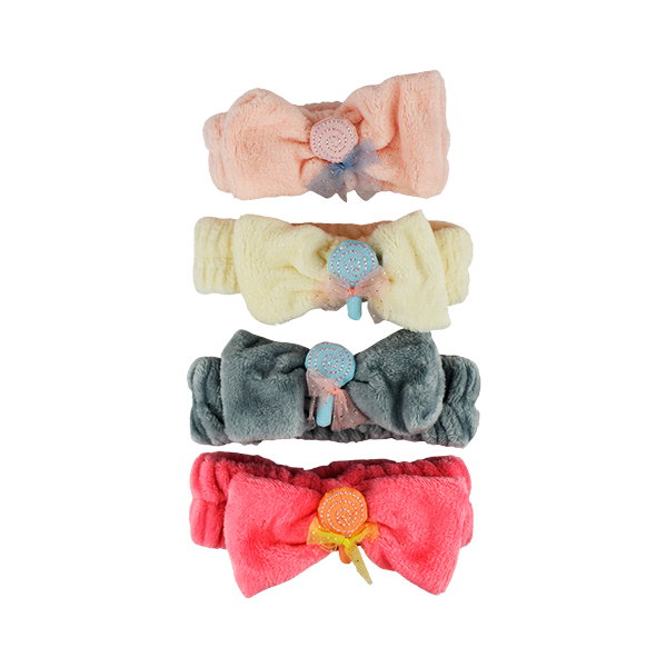 Banda para el cabello en presentación con moño